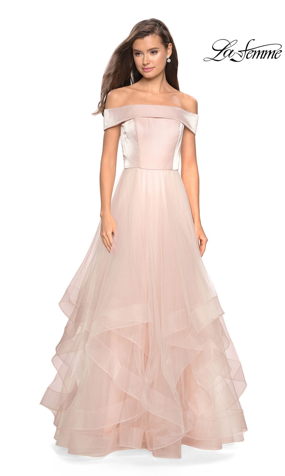 A woman wears the La Femme Off-Shoulder Long Tiered Prom Dress 27224 in blush pink with a flowing tulle skirt. The La Femme logo is displayed in the top right corner.